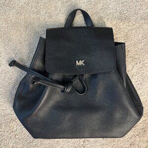 MICHAEL Michael Kors Junie Flap Medium Backpack in black with studying pebble gr